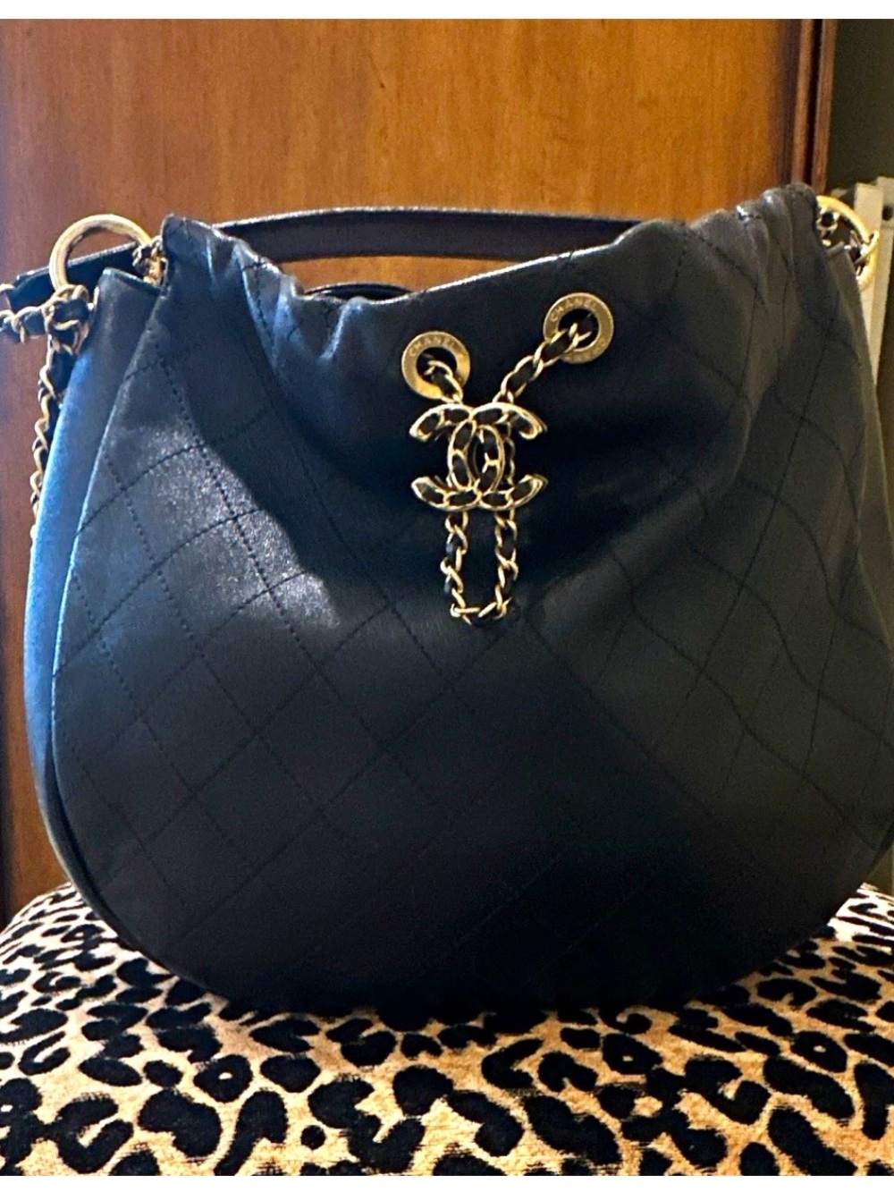 CHANEL Black Quilted Leather Drawstring Hobo with Gold Chain CC